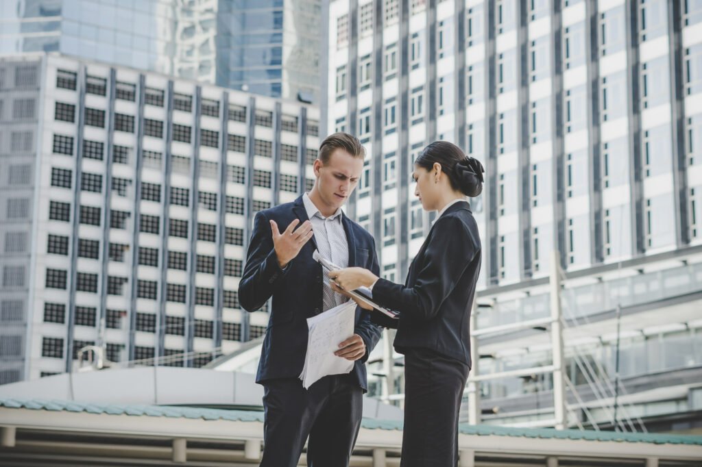 Busy corporate real estate reps at work, with little time for financial planning, but a great need for it.
